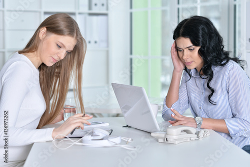 two young girls working 