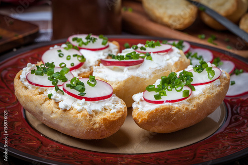 Toasts with radish, chives and cottage cheese.
