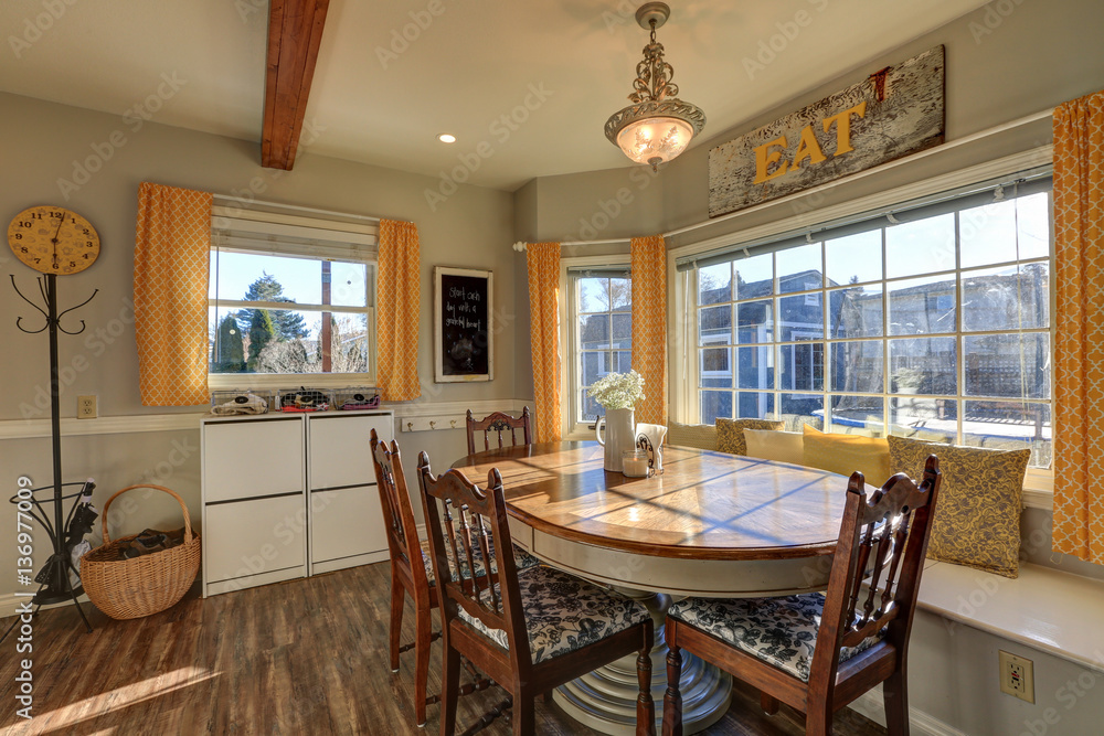 Sun filled breakfast nook with window seat Sun filled breakfast nook with window seat