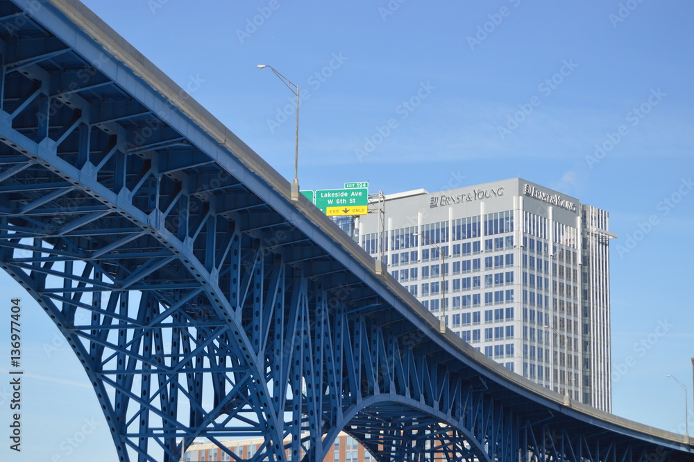 Bridge with corporate building and freeway sign in the background. Bridge with corporate building and freeway sign in the background.