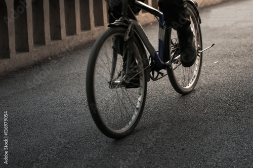 Man on bicycle in blur