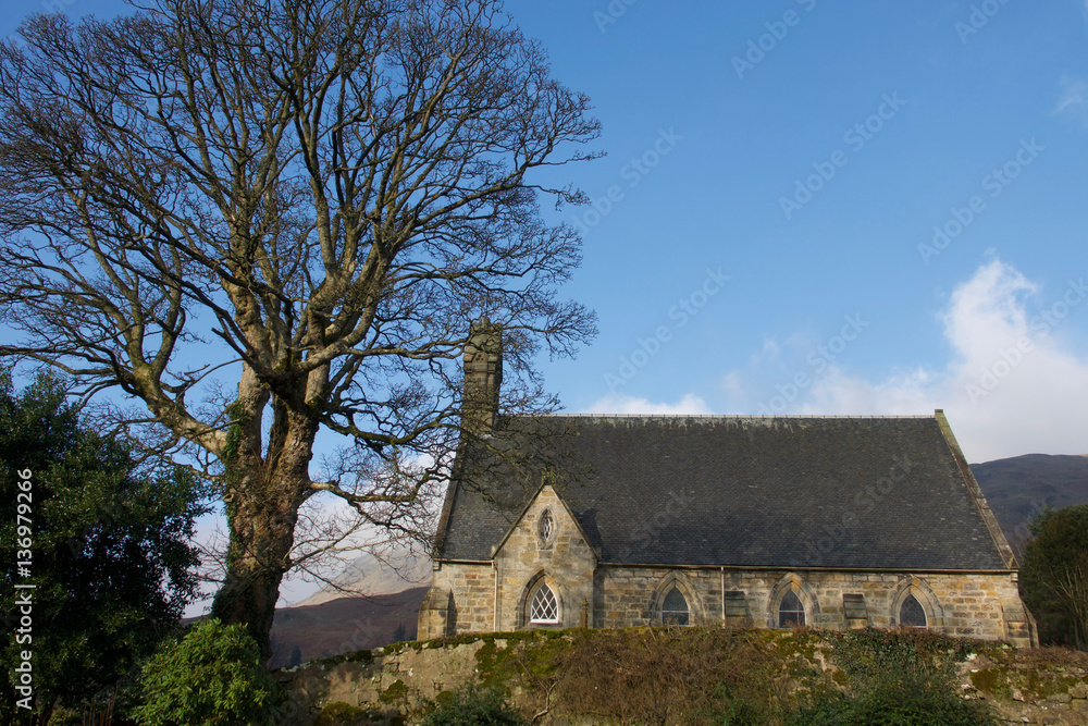 Country church with trees and hills Country church with trees and hills
