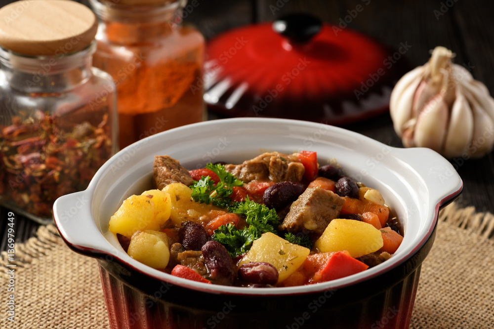 Stewed beef with vegetables and red beans.