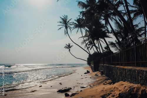 Tropical vacation holiday background - paradise idyllic beach. Sri Lanka