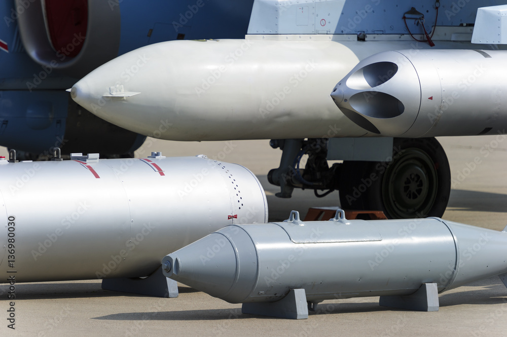 Missiles, bombs, rocket launcher and other guided and unguided armament of fighter jet, modern weapon of aircraft, military industry, selective focus Missiles, bombs, rocket launcher and other guided and unguided armament of fighter jet, modern weapon of aircraft, military industry, selective focus