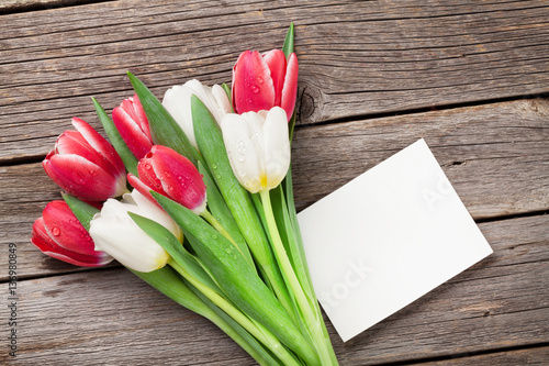 Fototapeta Naklejka Na Ścianę i Meble -  Colorful tulips bouquet and blank greeting card