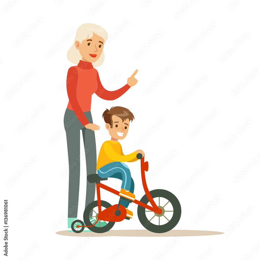 Grandmother Teaching Boy To Ride Bicycle, Part Of Grandparents Having Fun With Grandchildren Series Grandmother Teaching Boy To Ride Bicycle, Part Of Grandparents Having Fun With Grandchildren Series