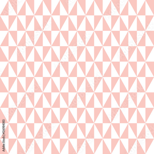 Geometric pattern with pink and white triangles. Seamless abstract background