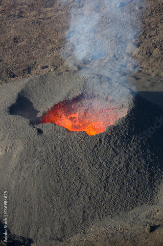 Erupting volcano, molten magma. Reunion island, France
