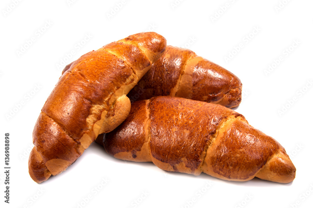 Fresh butter croissant, isolated on white background.