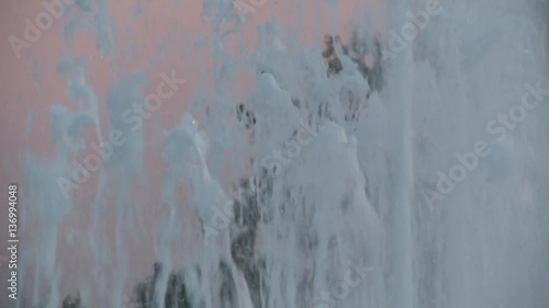 Fountain in a city during the evening hours