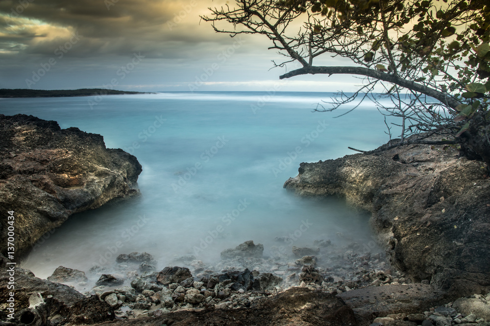 Playa Blanca, Rafael Freyre, Holguin, Cuba. Long exposure ocean front dawn.