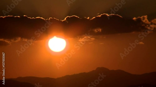 Sunset behind hills