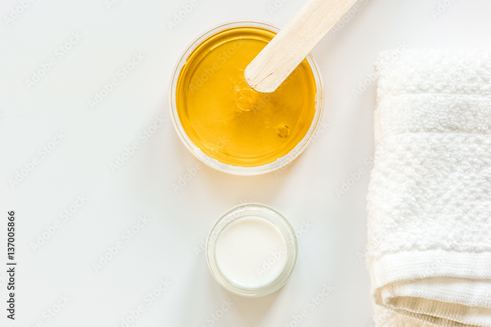 concept depilation with wax on white background top view concept depilation with wax on white background top view
