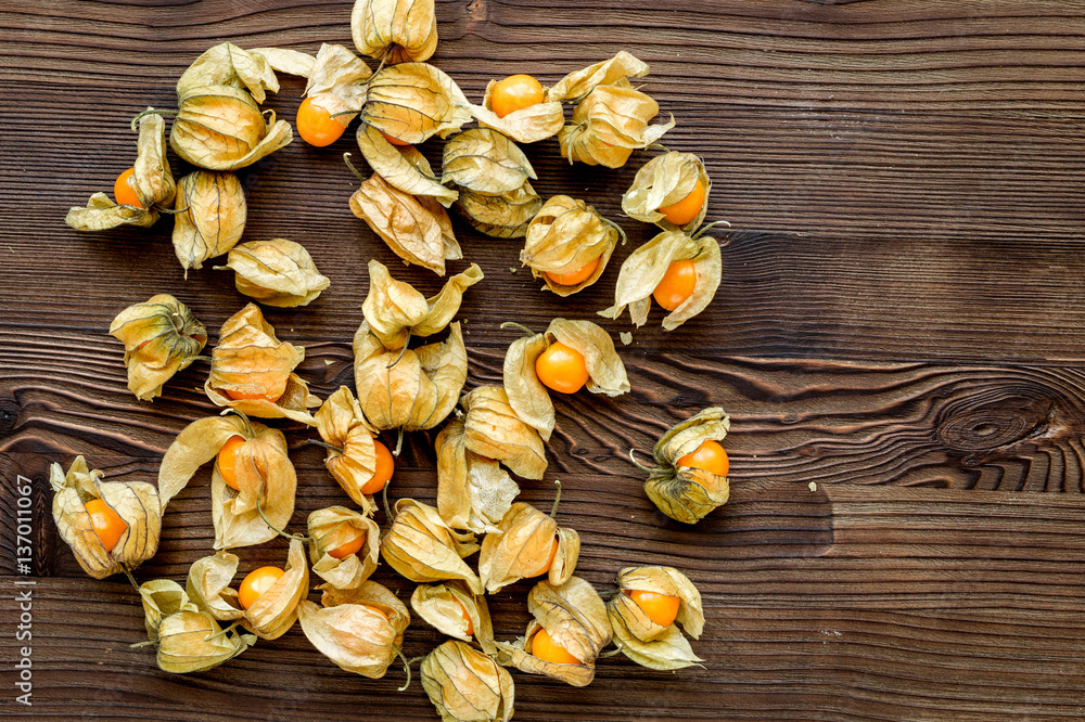 physalis on wooden background top view mock up physalis on wooden background top view mock up