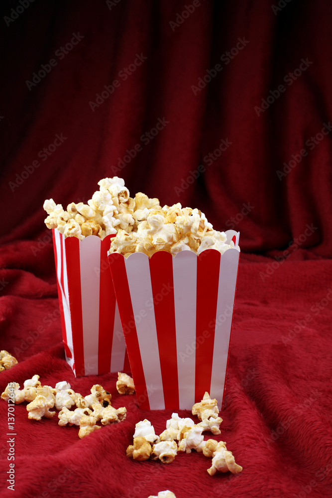 Cinema concept with popcorn and clapperboard Cinema concept with popcorn and clapperboard