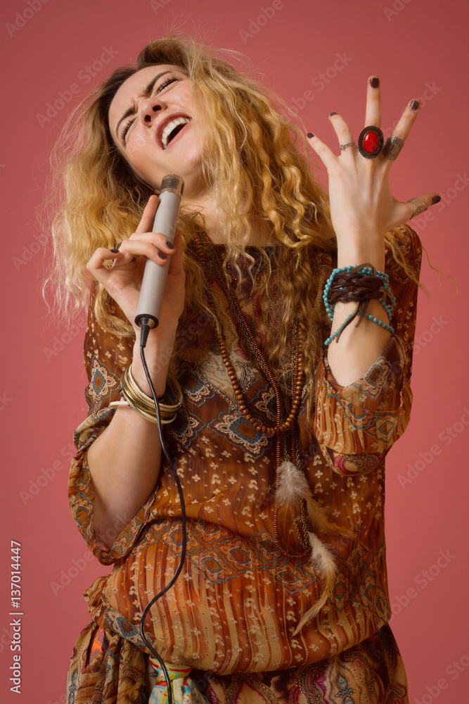 Rock star singing into a microphone Rock star singing into a microphone