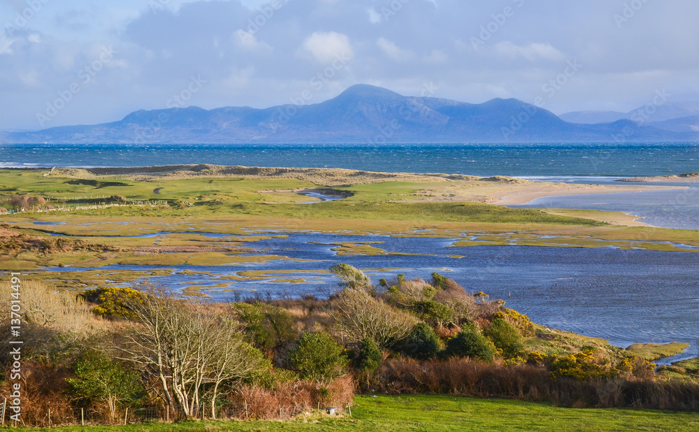 Beautiful Bright Irish Countryside Landscape shot on Achill Island in County Mayo coast Line on Wild Atlantic Way. The most popular rural tourist spot in Ireland for weekend trip or ocean scenic drive