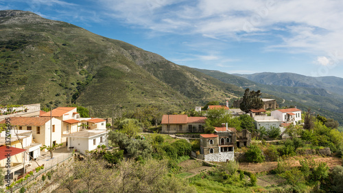 Houses in valley between the hills on Crete Island. Greece. © vivoo