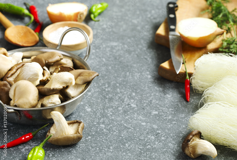 Food ingredients: oyster mushrooms, hot peppers and rice noodles Food ingredients: oyster mushrooms, hot peppers and rice noodles