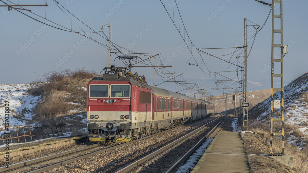 Fast train in station Spisske Tomasovce