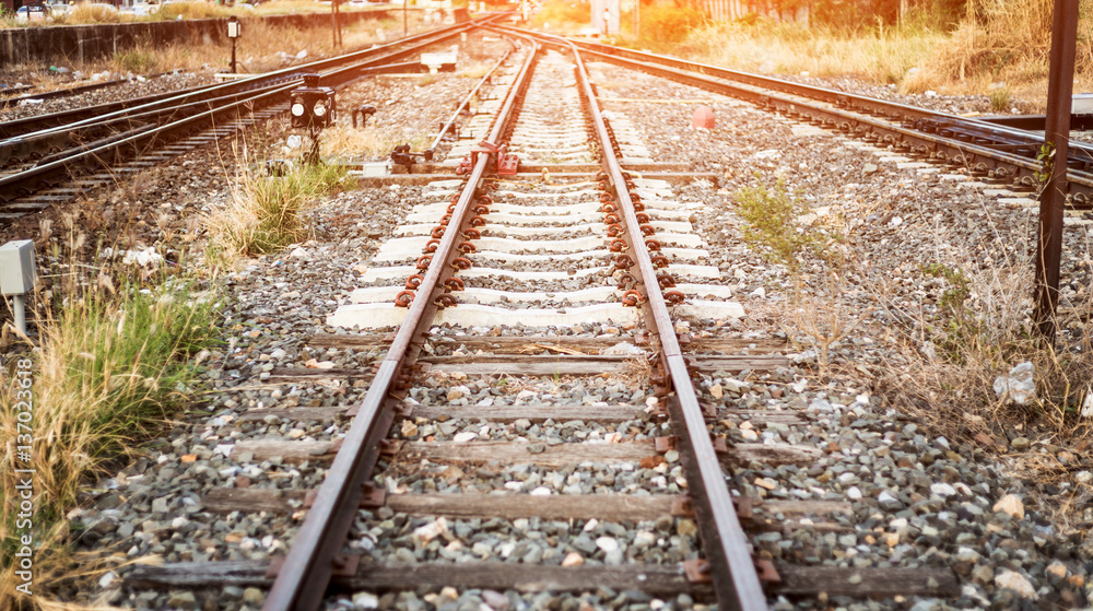 Life is a journey as a thought. Image of an empty railroad taken from low point of view. Also image has a vintage effect.