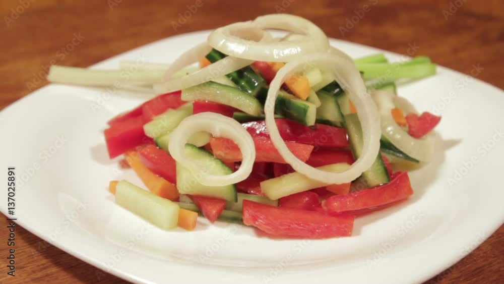 Healthy salad with fresh vegetables. Dietetic foods from environmentally friendly organic products. Vegetables from his garden. Slow rotate (1080p 25 fps; canon 7d, Sigma 24-70) Healthy salad with fresh vegetables. Dietetic foods from environmentally friendly organic products. Vegetables from his garden. Slow rotate (1080p 25 fps; canon 7d, Sigma 24-70)