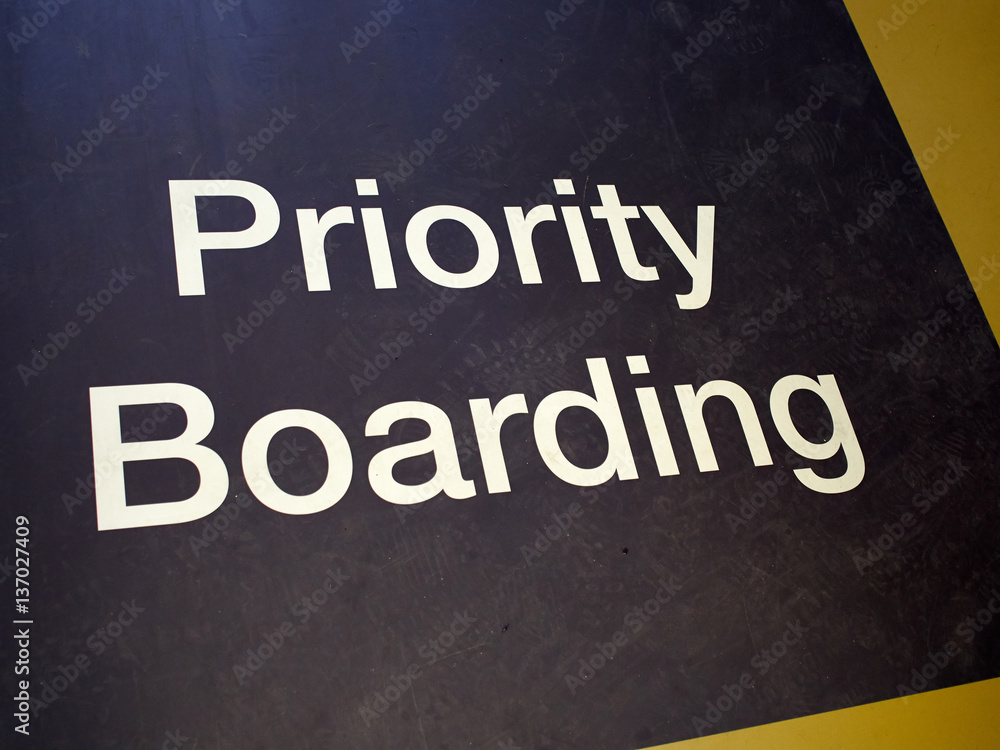 Fototapeta premium Priority boarding mat sign in an international airport