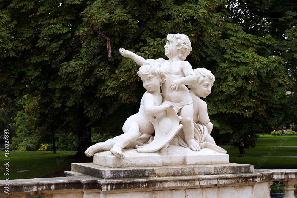Travel to Vienna, Austria. A statue in a park.