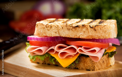 Sandwich with ham on a table