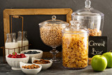 Cereal bar or buffet wih cornflakes, fruit and nuts