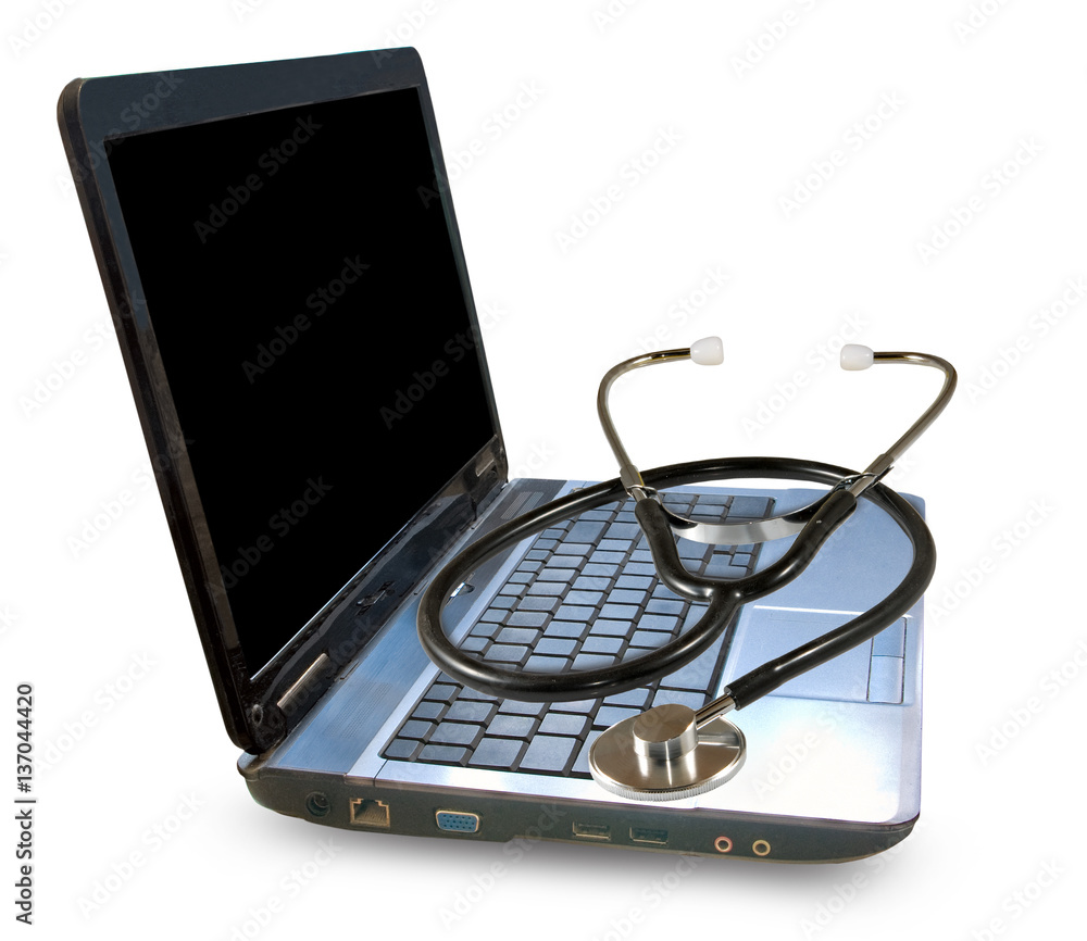 image of a laptop and stethoscope on a white background image of a laptop and stethoscope on a white background