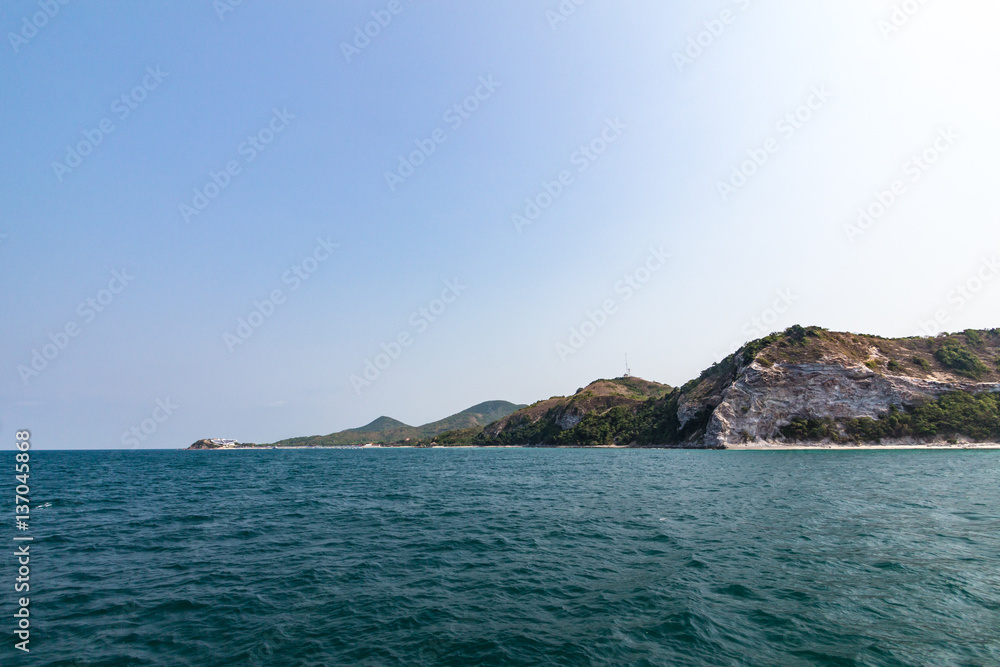 cliff near samae beach koh larn island from sea 01 cliff near samae beach koh larn island from sea 01
