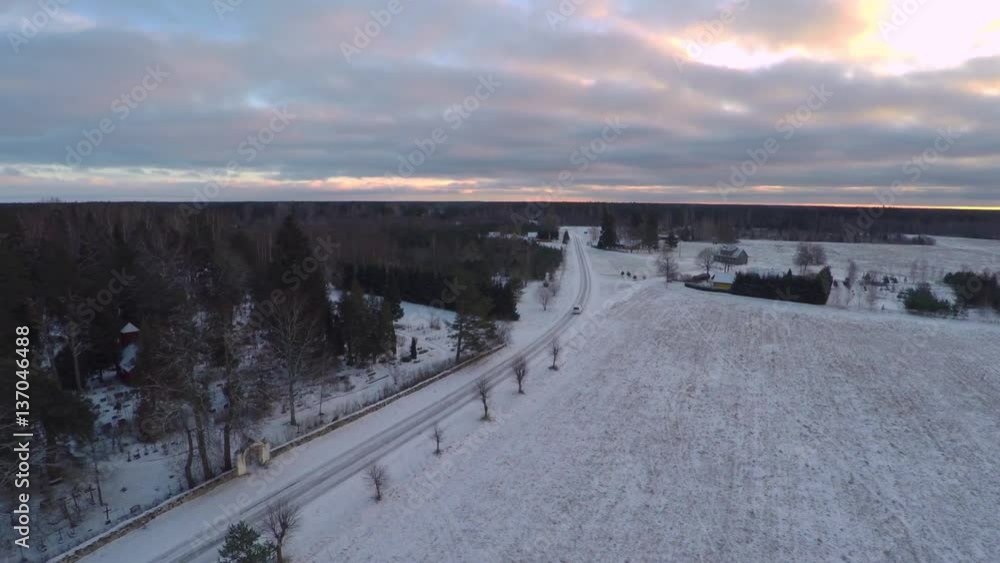 Winter landscape covered in snow at sunset. Aerial footage. Winter landscape covered in snow at sunset. Aerial footage.