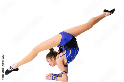 Young gymnast on a white background.
