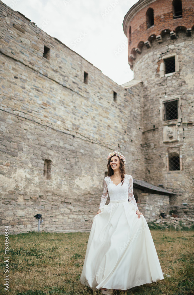 The bride near tower of castle