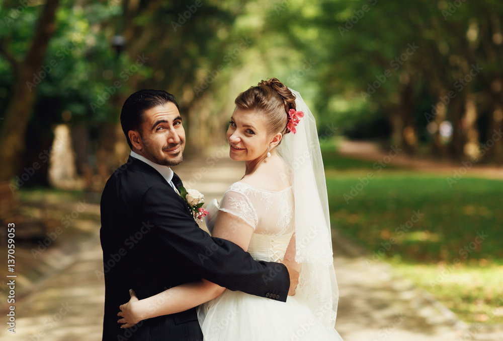 The smiling couple in love in the park