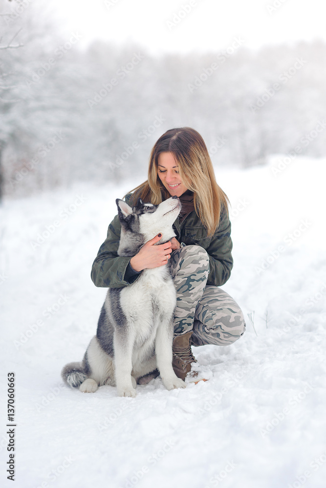 beautiful girl with huskies beautiful girl with huskies