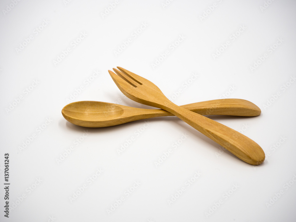 Wooden spoon and fork on white background Wooden spoon and fork on white background