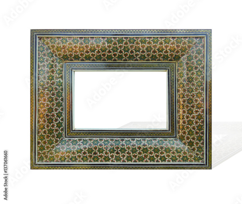 Orient style incrusted antique frame isolated on white background. Suitable for art decoration. photo