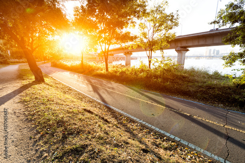 Photography traffic on road near river in seoul at sunrise