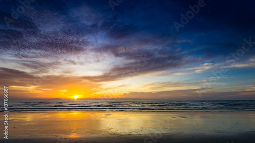 beautiful beach in the morning with clouds and reflection © Tawatchai