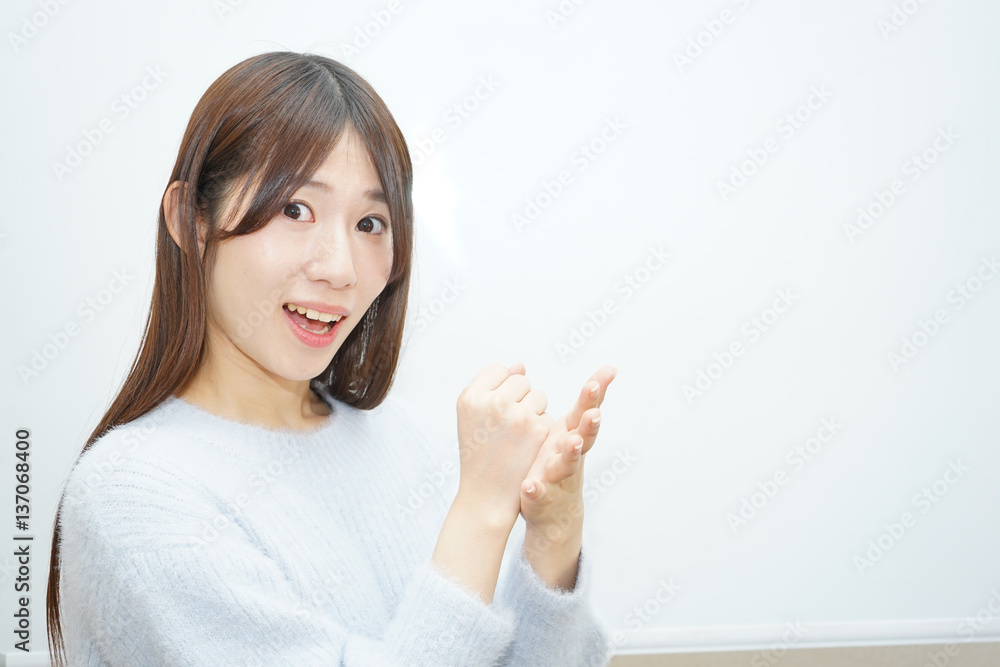 Young woman thinking something with white background Young woman thinking something with white background