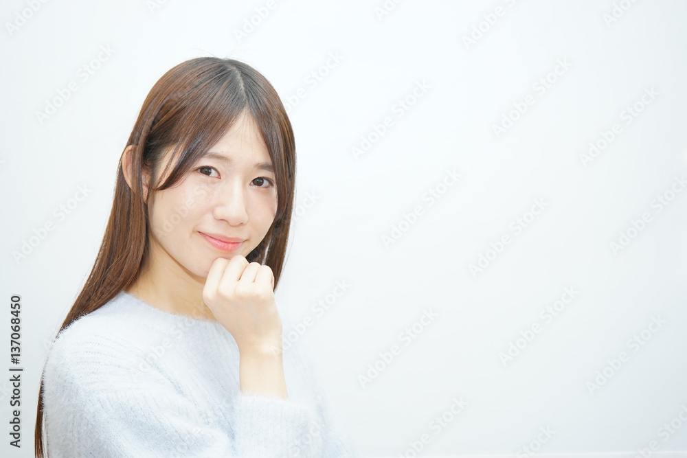 Young woman thinking something with white background Young woman thinking something with white background