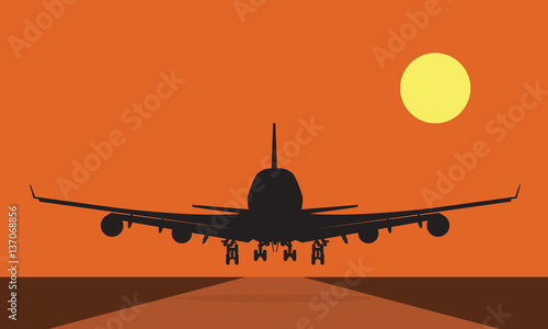 Landing plane over runway at sunset. Flat and solid color travel concept background.