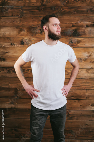 Man wearing white blank t-shirt with space for your logo