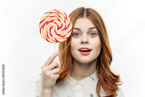 round lollipop red white and beautiful woman