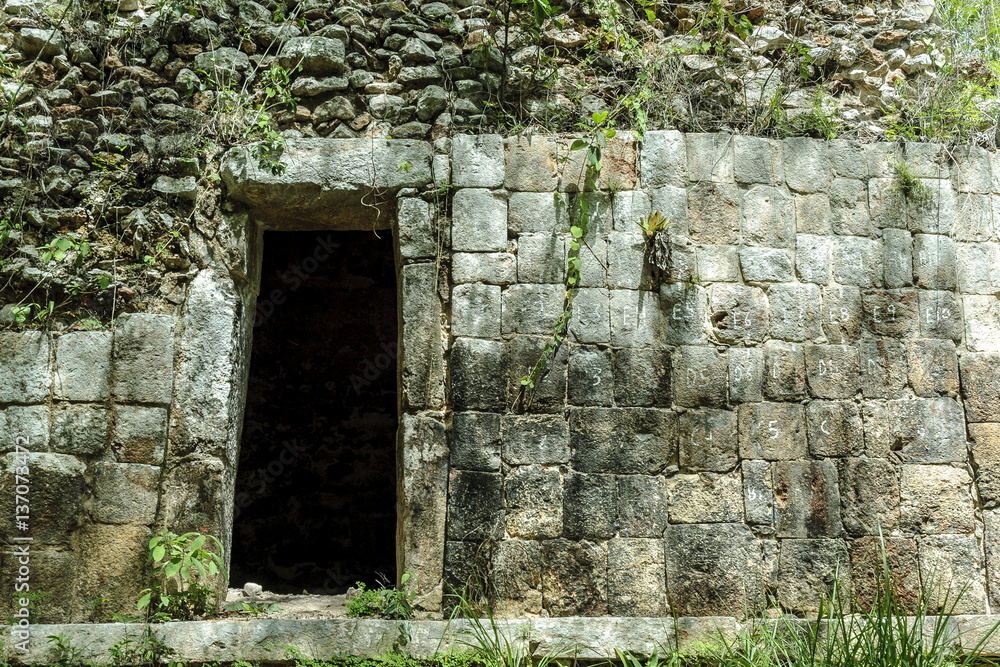 sight of a building in ruins in the Mayan archaeological enclosure of Sayil, Yucatan, Mexico