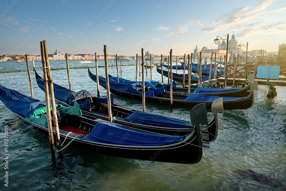 Venetian gondolas at sunset