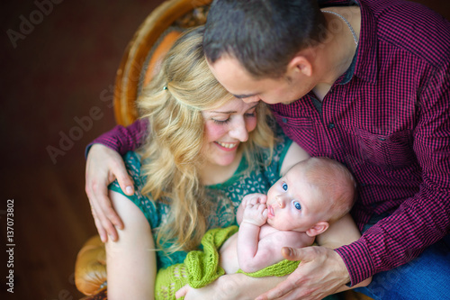 Happy family with the newborn son